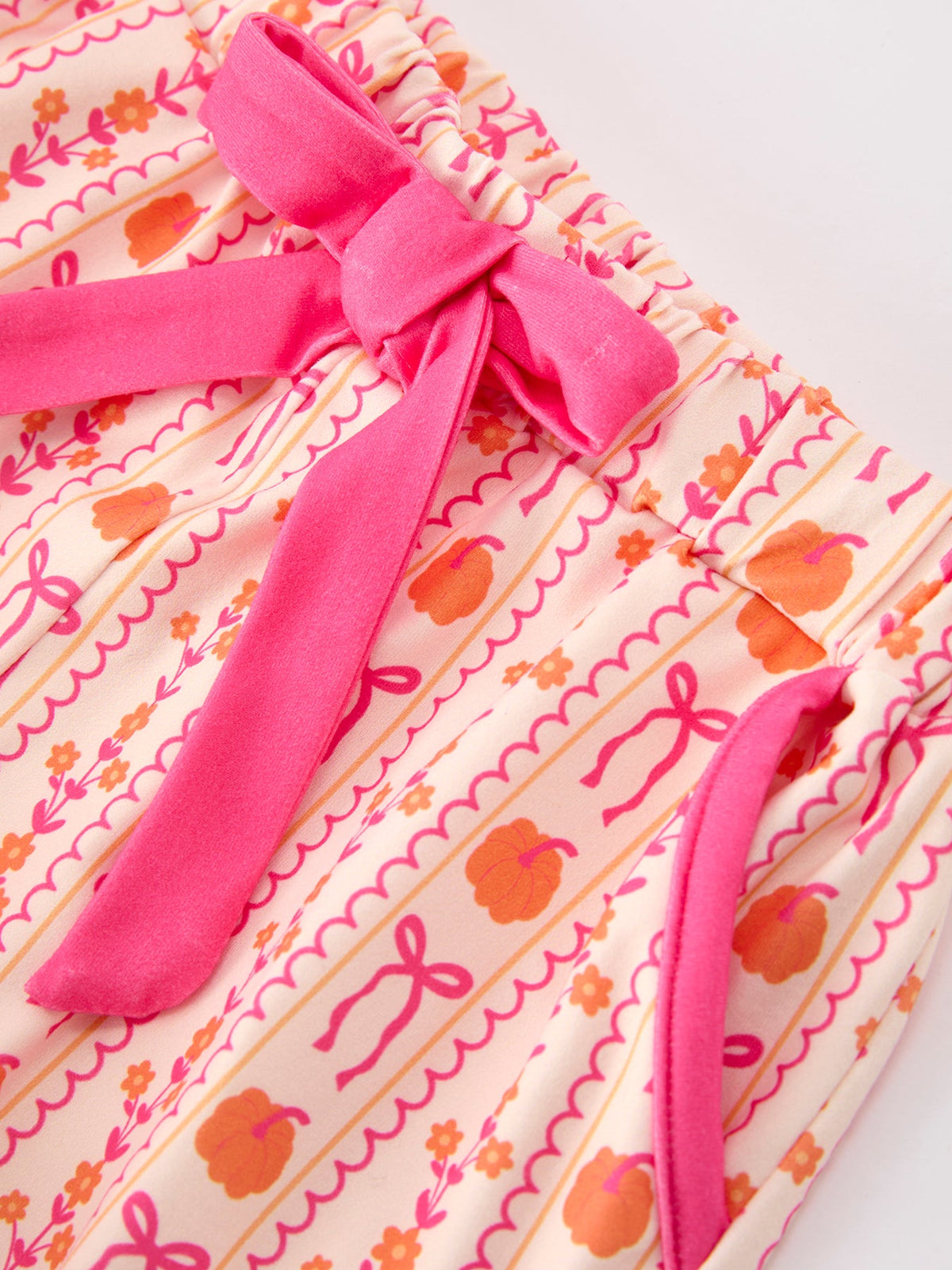 Polyester Spandex Pajama Set, Girls Pumpkin Bow by Rylee Faith Designs