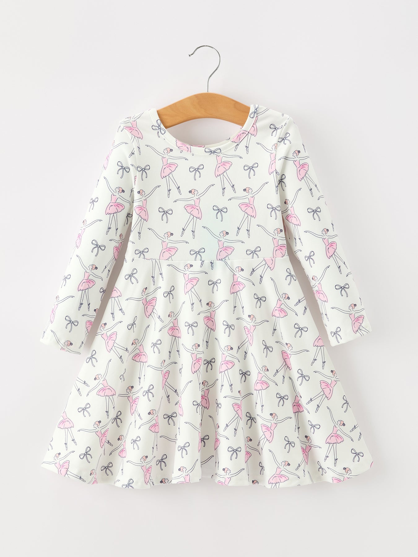 Girls long sleeve twirl dress with ballet shoe and bow prints and a full twirl skirt