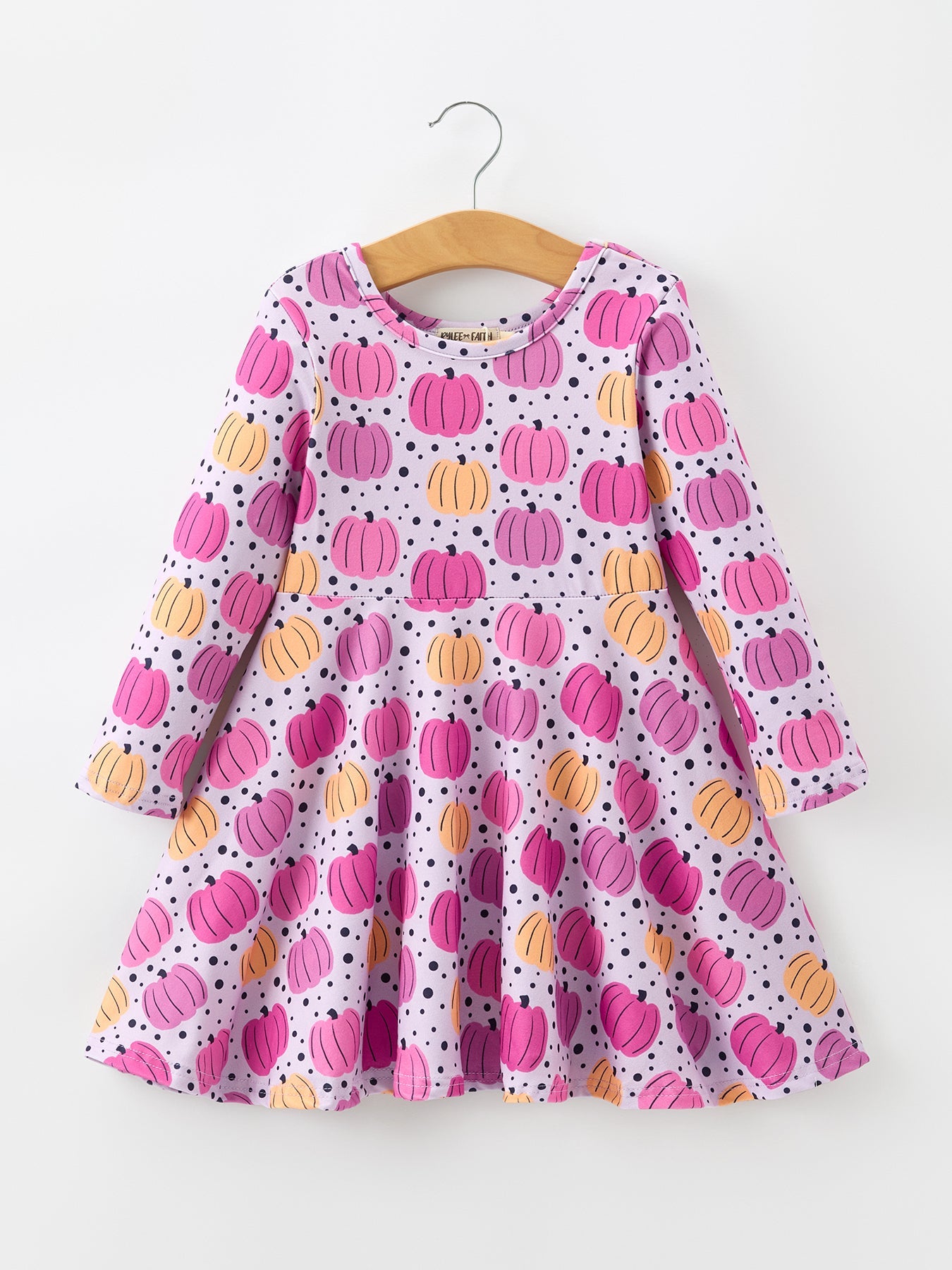 Long sleeve twirl dress with an allover pumpkin print and a full flowy skirt.