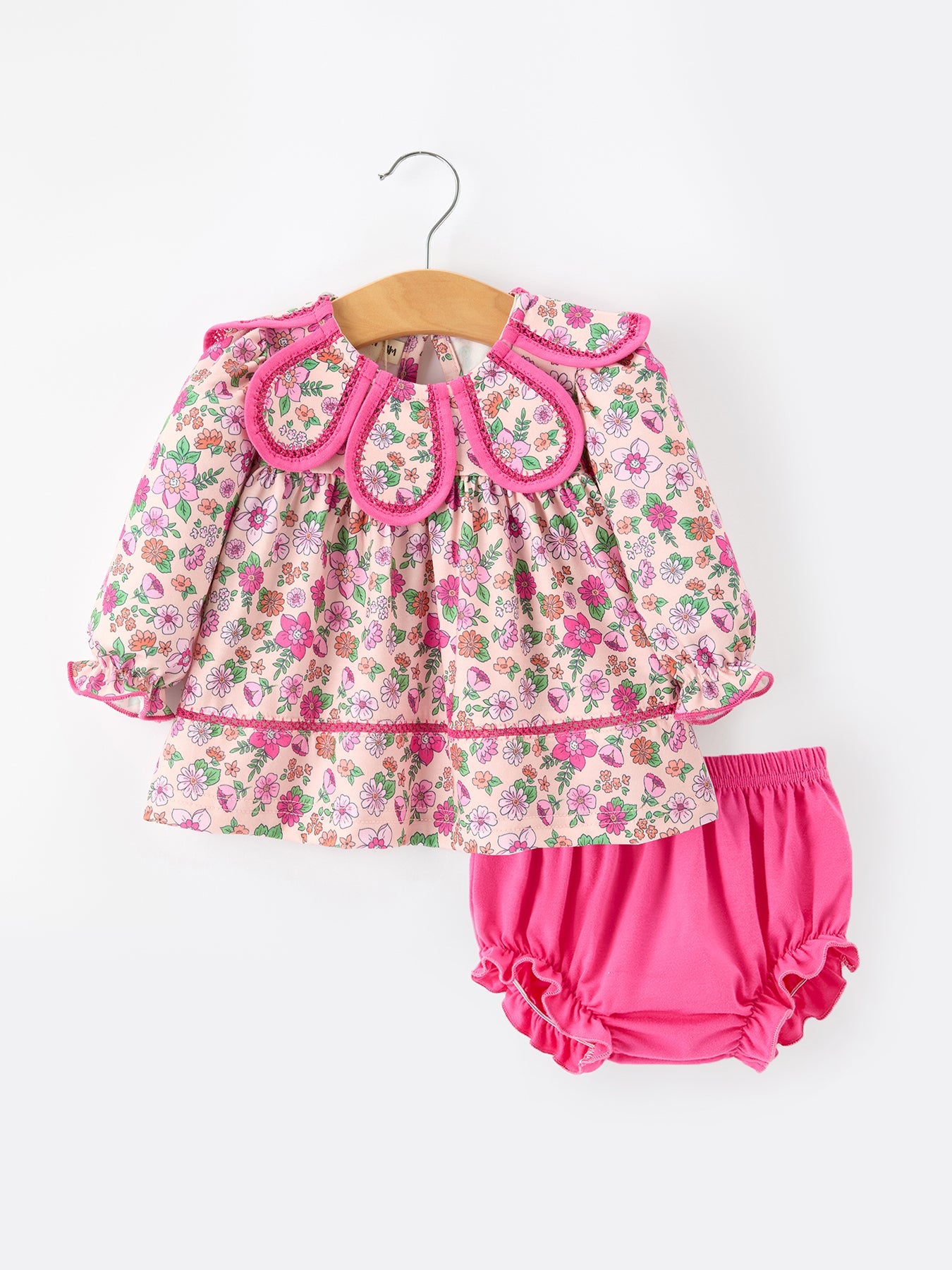 Girls' floral print top with hot pink petals collar and long sleeves paired with matching hot pink bloomers.