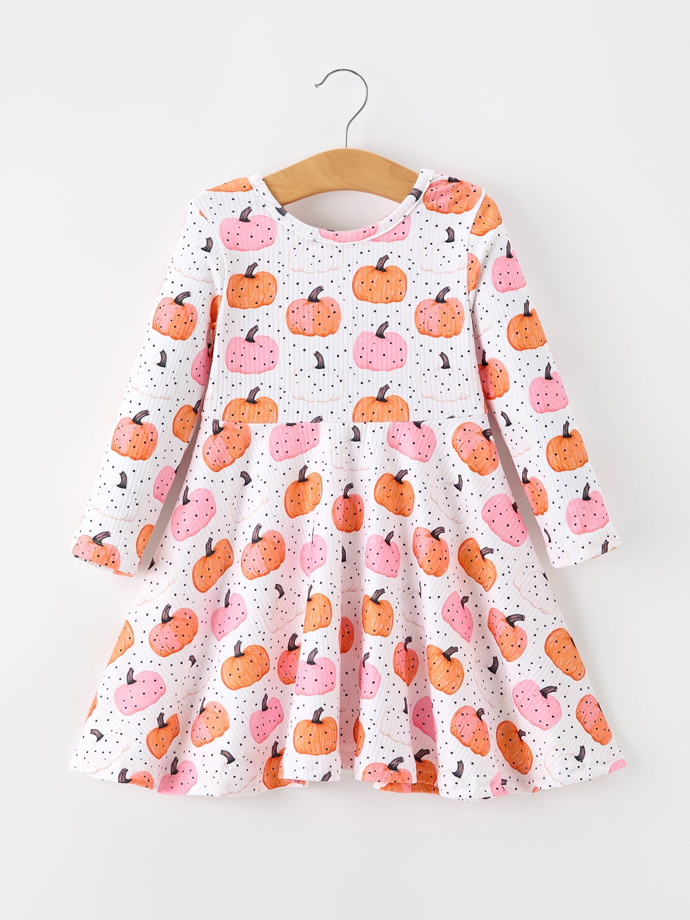 Long sleeve girls twirl dress with an all-over pumpkin print and a full, flowy skirt.