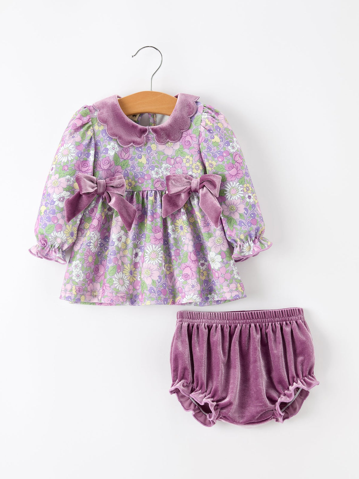 Baby girl set with purple floral top, velvet scalloped collar, side bows, and matching bloomers.