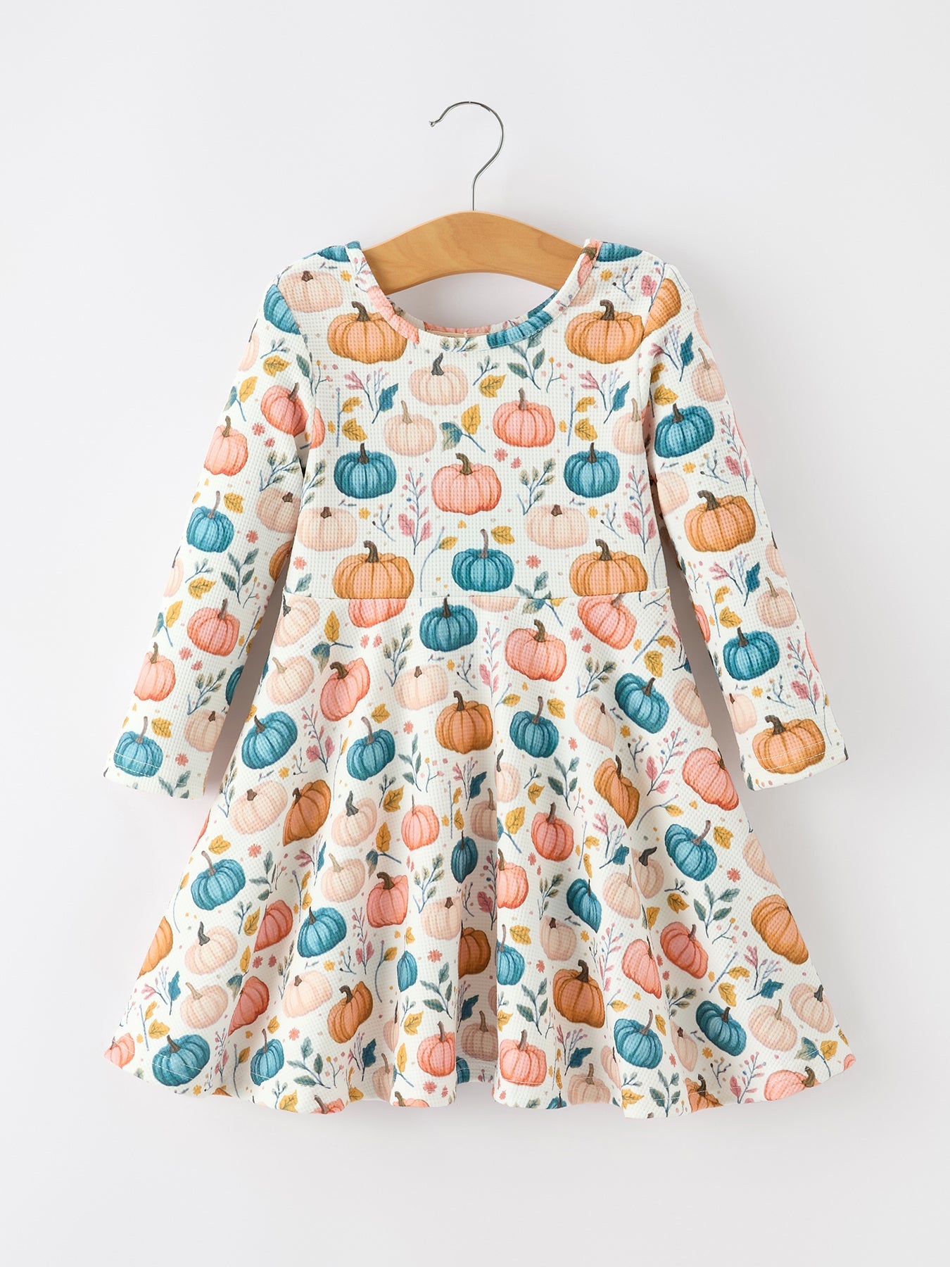 Girls' long-sleeved dress with a colorful fall pumpkin print