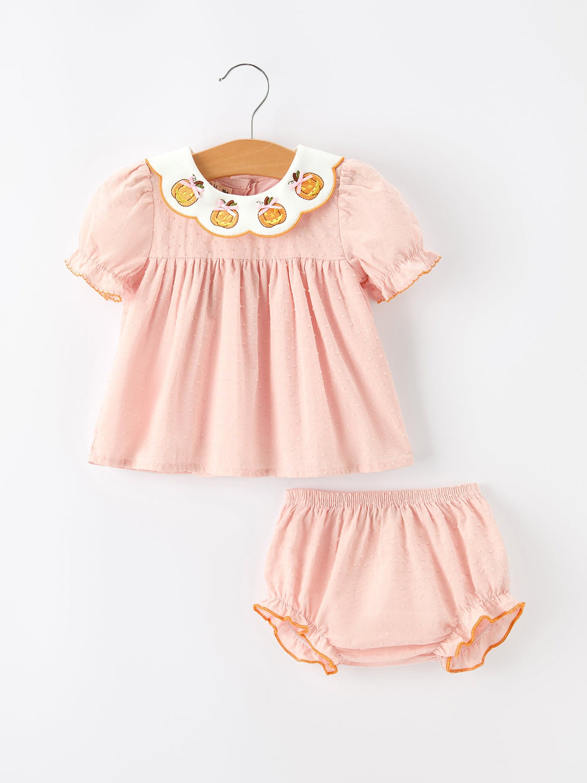 Girls bloomer set with Halloween pumpkin embroidery, puff-sleeve top with smocked neckline and matching bloomers