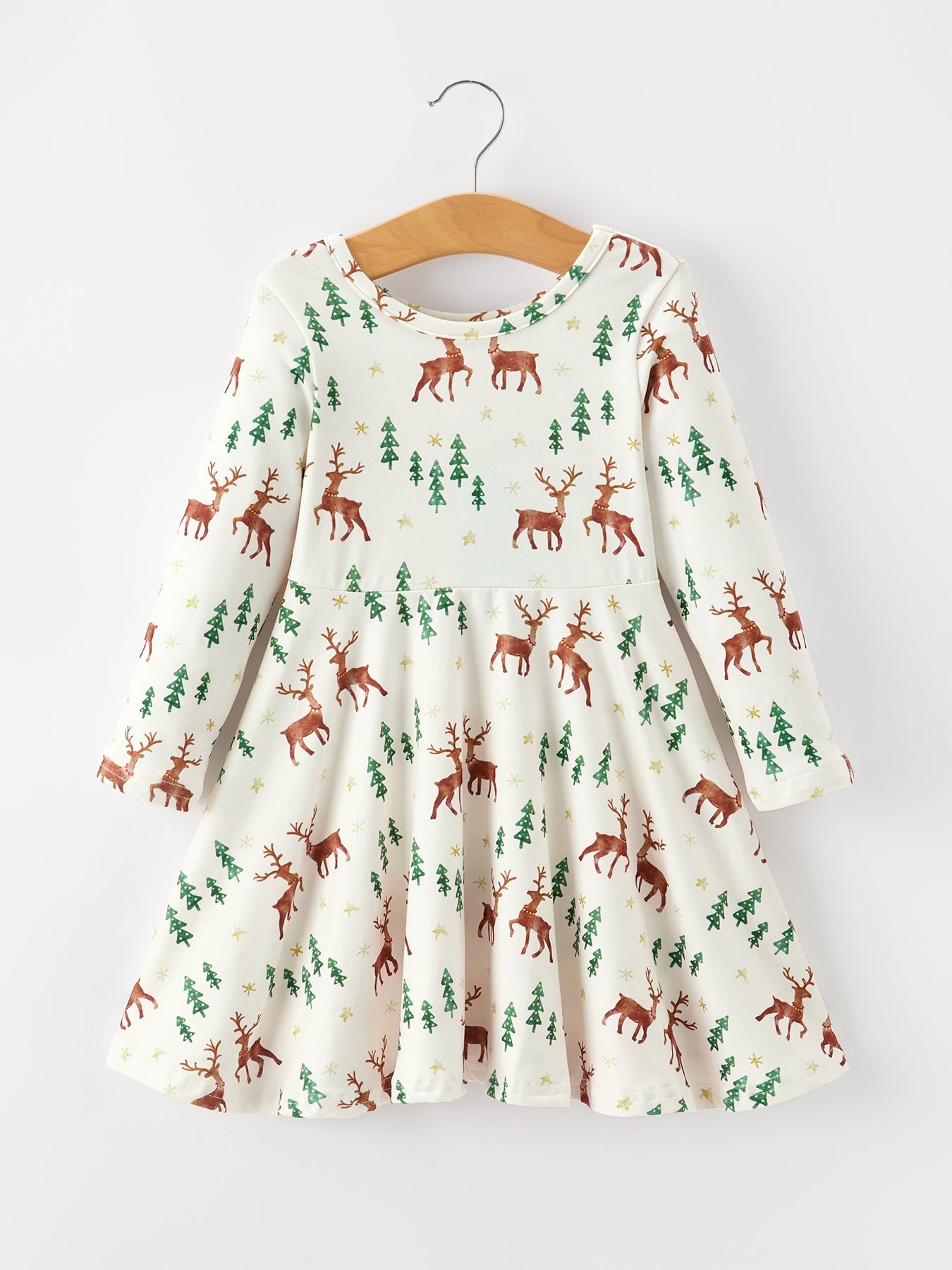 Girls twirl dress in ivory with an all-over holiday print of deer and pine trees