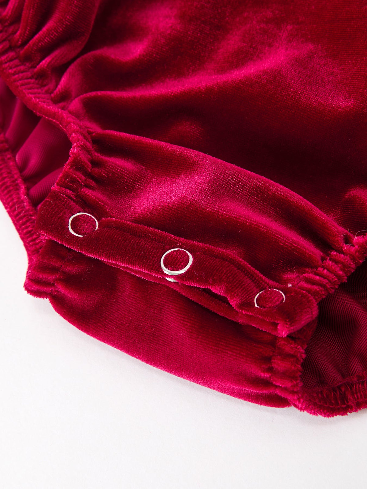 Christmas Velvet Smocked Baby Bubble Romper with Pearl Detail by Rylee Faith Designs