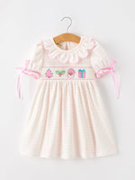 Girls Christmas dress with smocked bodice, holiday embroidery, scalloped ruffle collar, puff sleeves and flowy skirt
