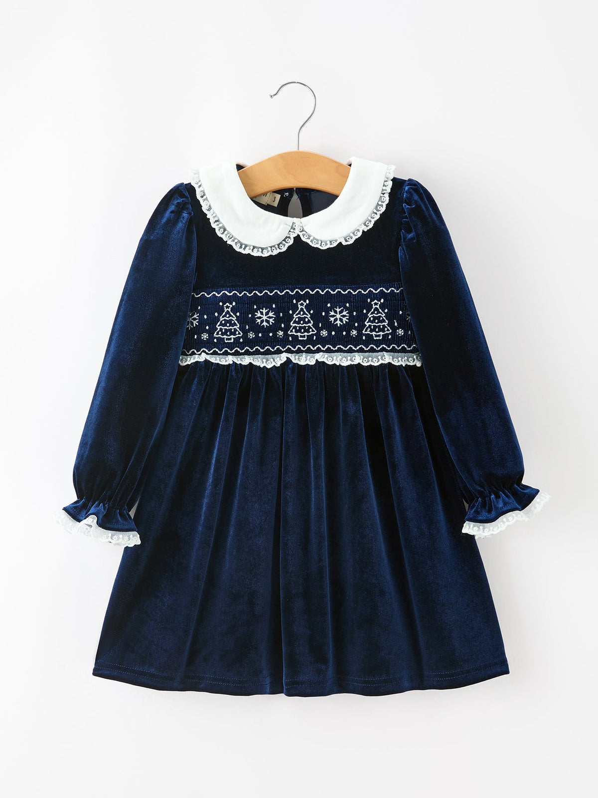 Navy velvet girls dress with embroidered Christmas trees and snowflakes on the smocked chest, white lace Peter Pan collar