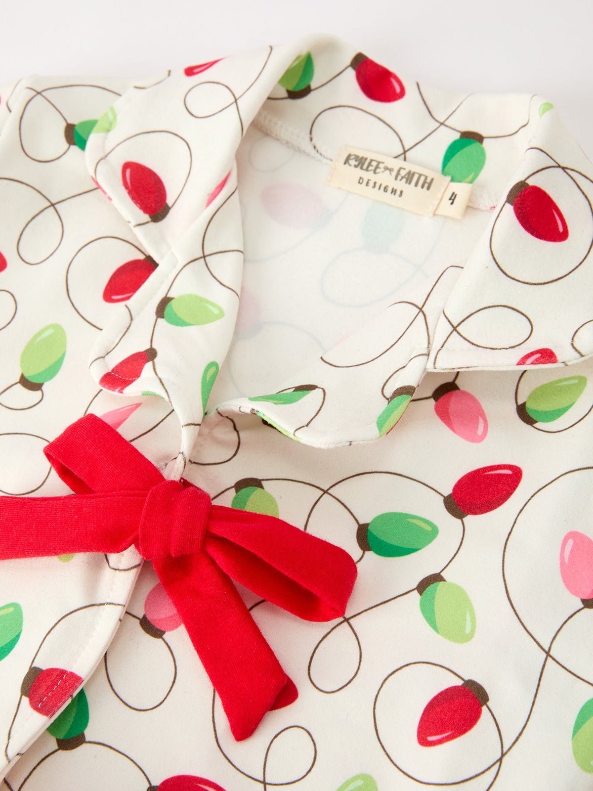 Christmas Lights Print Bow Tie Pajamas Set by Rylee Faith Designs