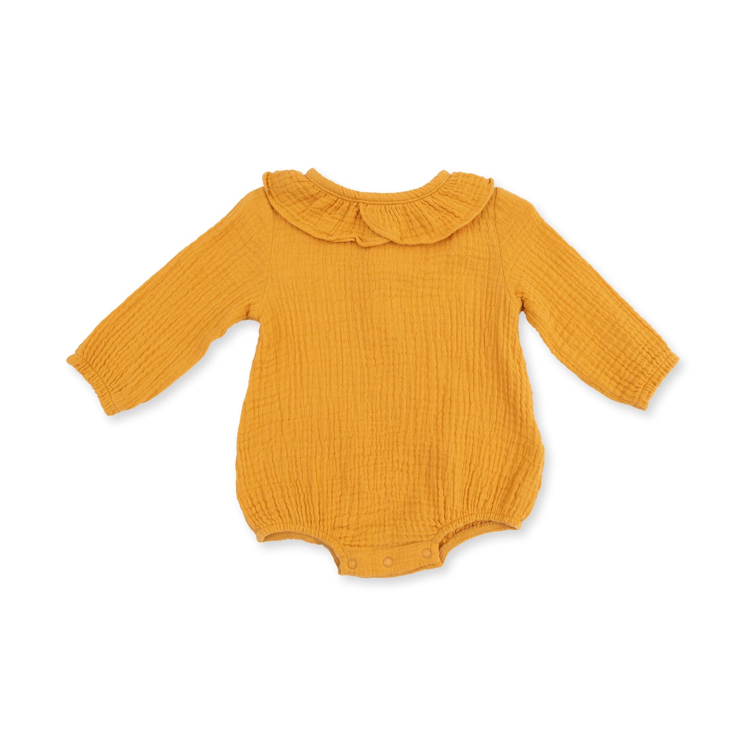 Baby bubble romper in sunflower print organic muslin with a ruffle collar and snap closures