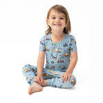 Short sleeve loungewear set with a crayon-drawn construction truck print on top and matching pull-on pants