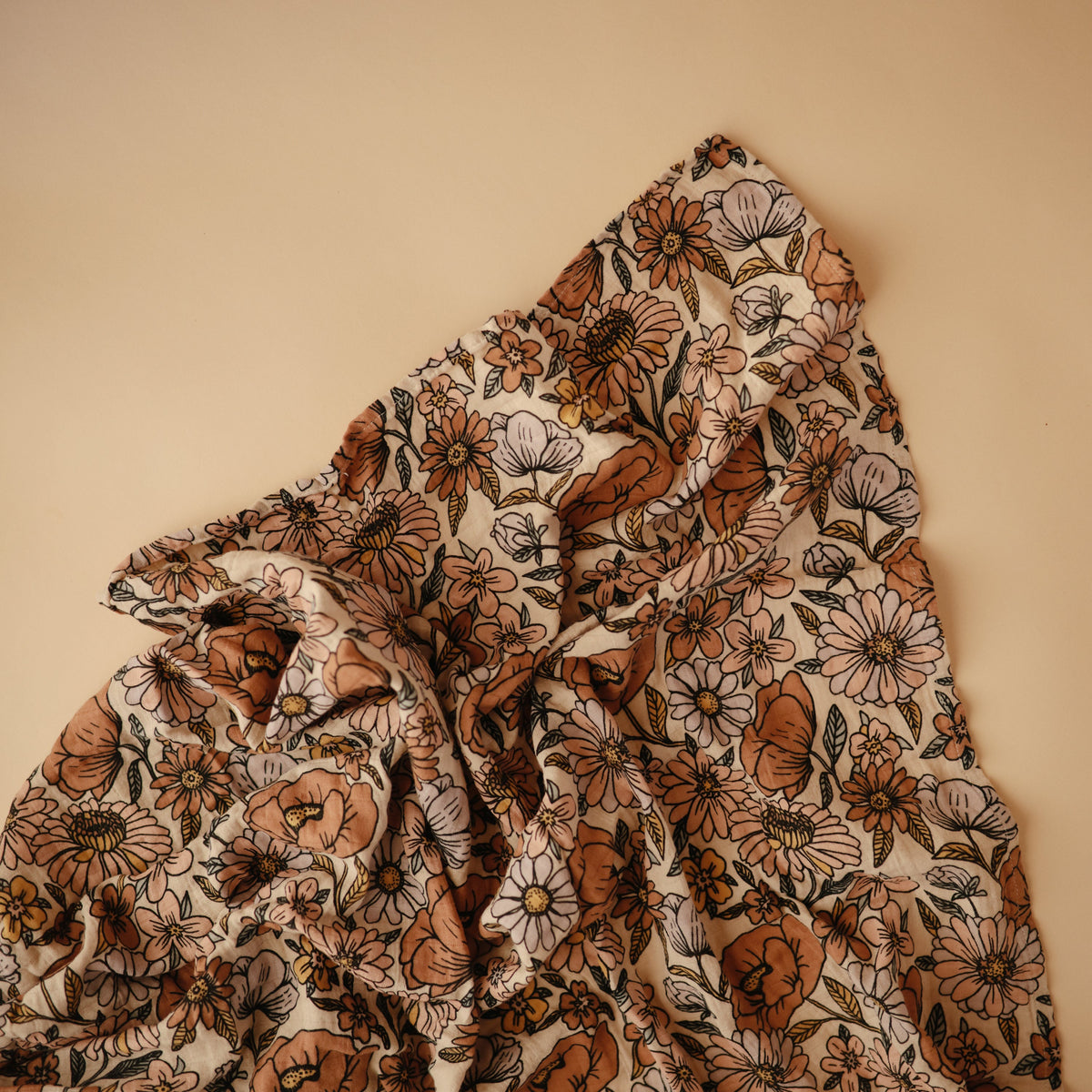 Soft Mushie organic cotton muslin swaddle blanket