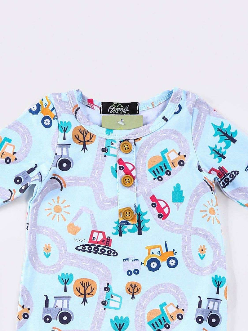 Clover Cottage baby knotted gown and matching hat with playful town print.