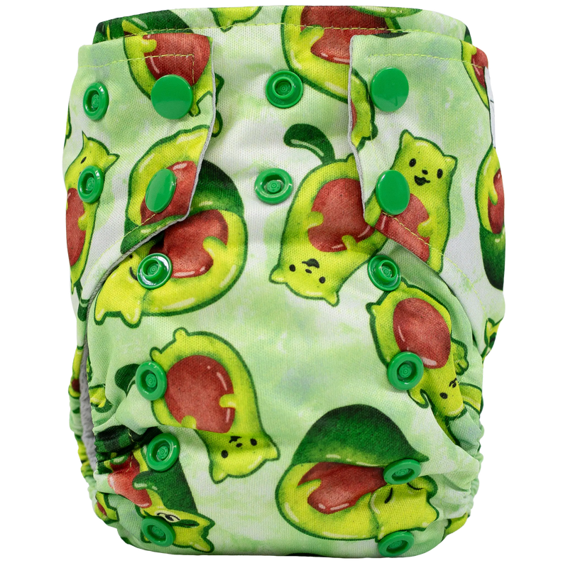 Tiny Tushies Newborn AIO cloth diaper with green avocado print and closure snaps.