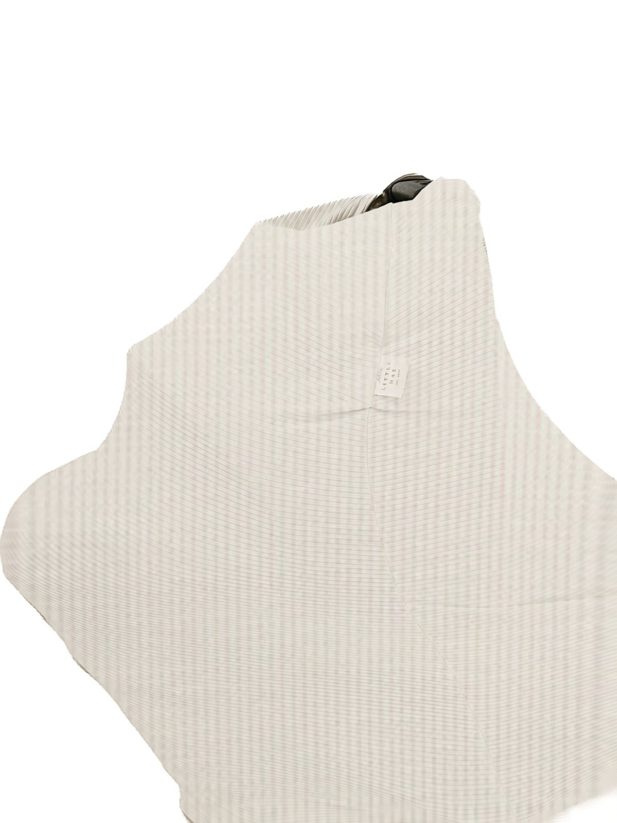 Close-up of a Little Mae & Co Coco Waffle Organic Car Seat Cover in a soft brown hue, draped over a car seat.