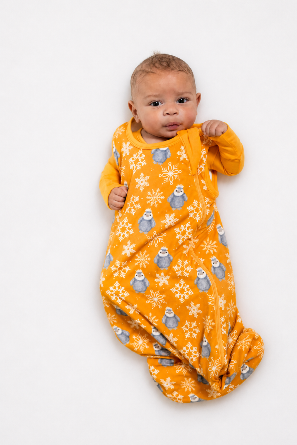 My First Snow Fall - Penguin Sleep Sack In Purple & Gold by Rayn’s Tiny Stitches