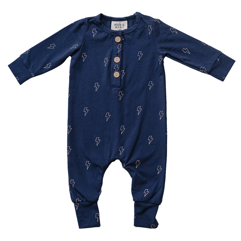Long sleeve full-length baby romper with an all-over lightning bolt print and a button front.