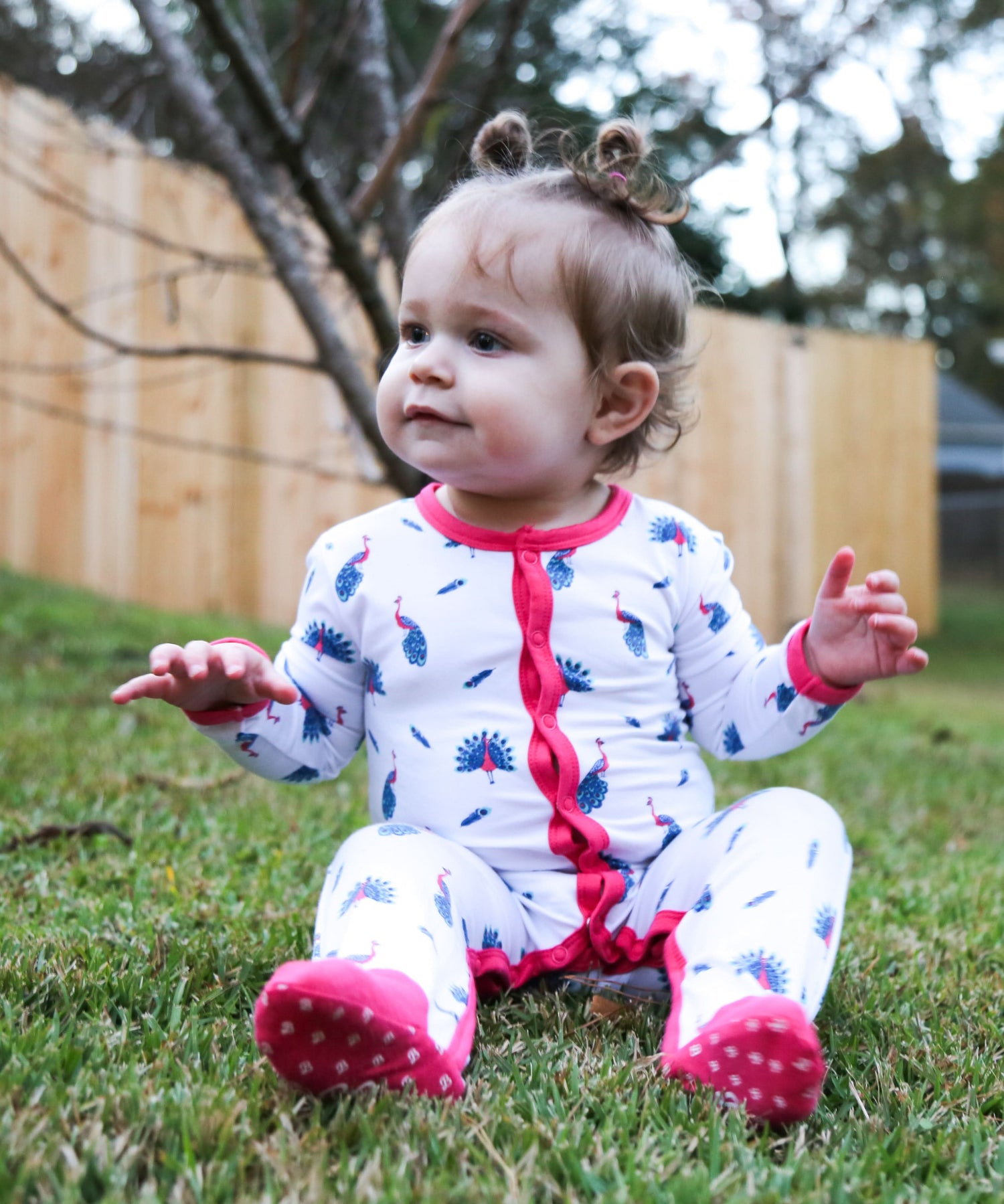 Baby snap footie pajamas in peacock blue with front snaps and footed legs