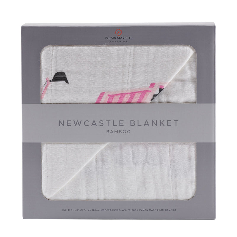 Pink Digger and White Bamboo Muslin Newcastle Blanket in packaging.