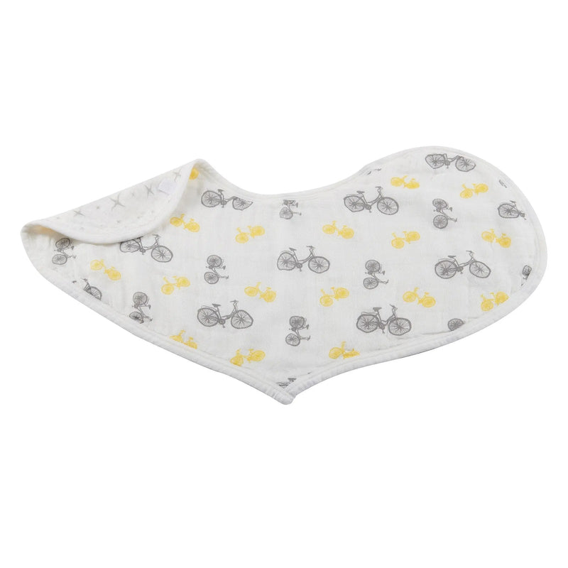 Soft heart-shaped Traveler Bamboo Heart Bibs with bicycle print, made from 100% natural bamboo muslin, featuring multiple snaps for adjustable fit.