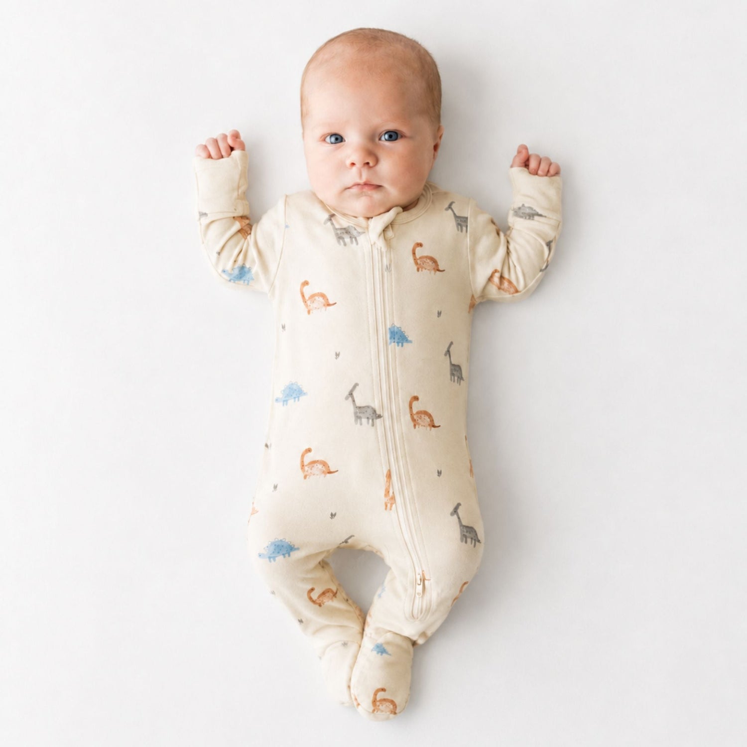 Baby footie pajamas with an all-over dinosaur print and a full-length front zipper