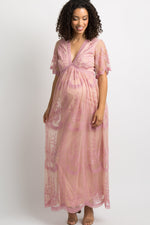 Pink maternity maxi dress with lace mesh overlay, floor-length with sandals