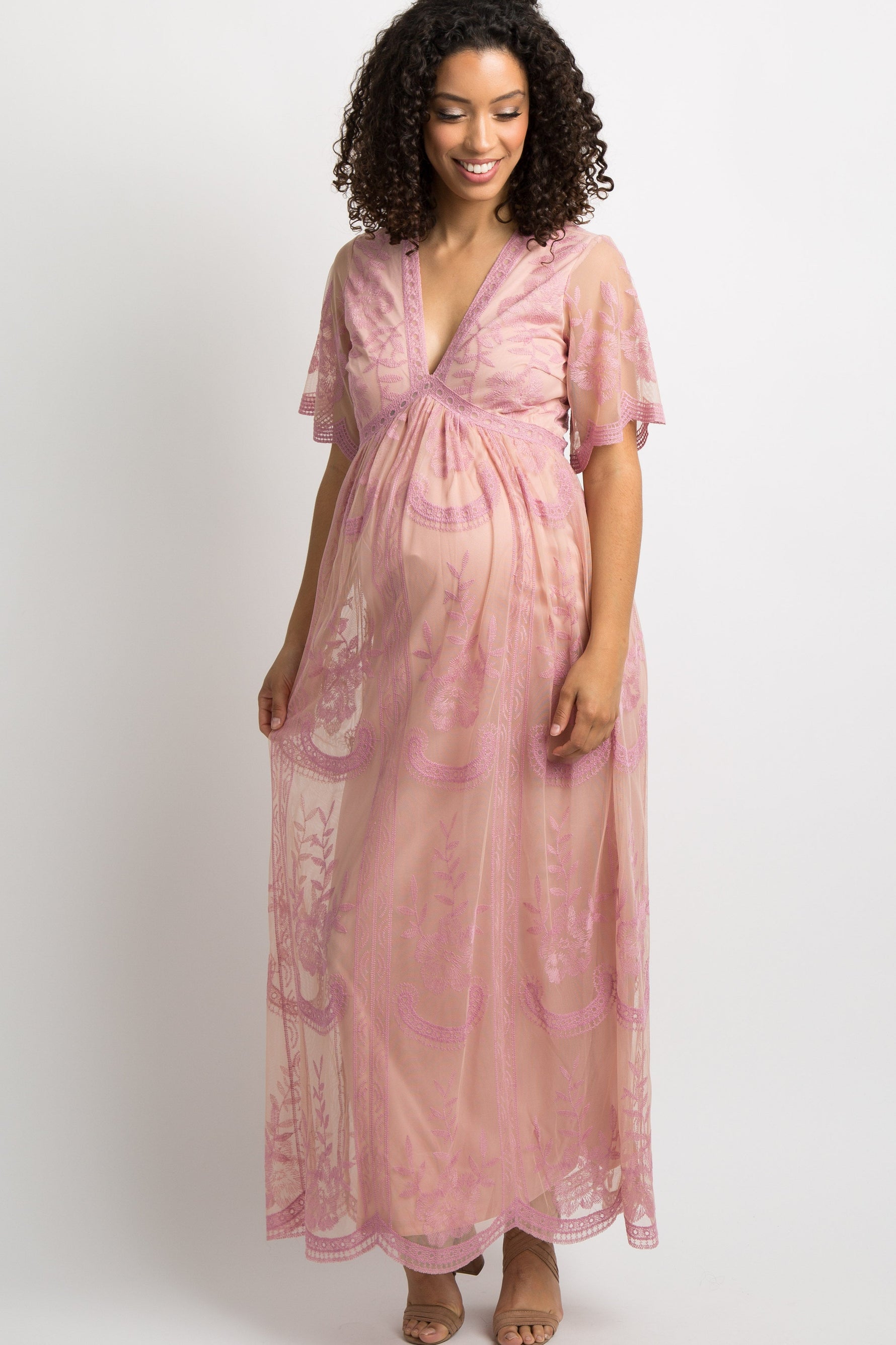 Pink maternity maxi dress with lace mesh overlay, floor-length with sandals
