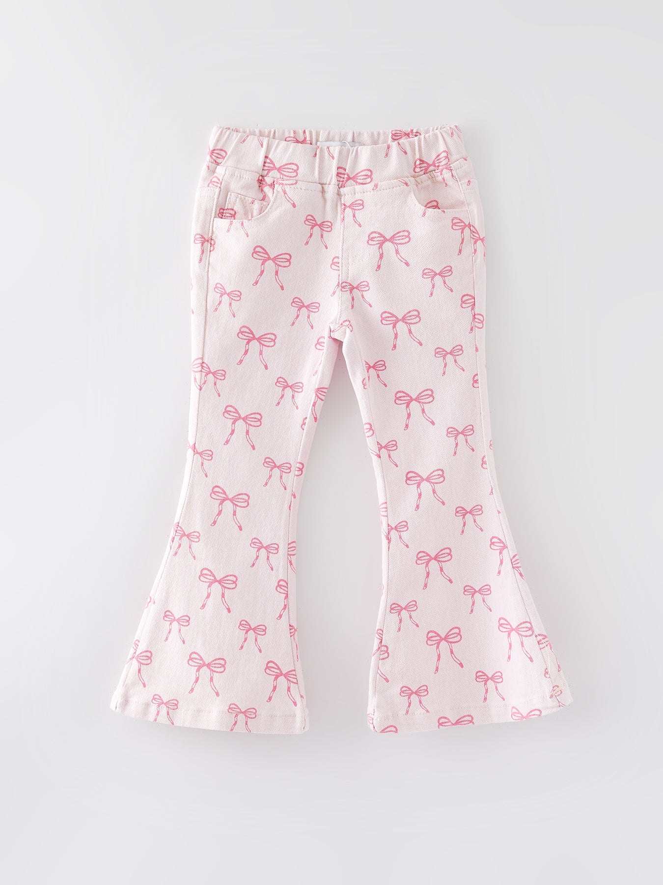 Girls flared denim jeans with an all-over pink bow print and an elastic waistband.