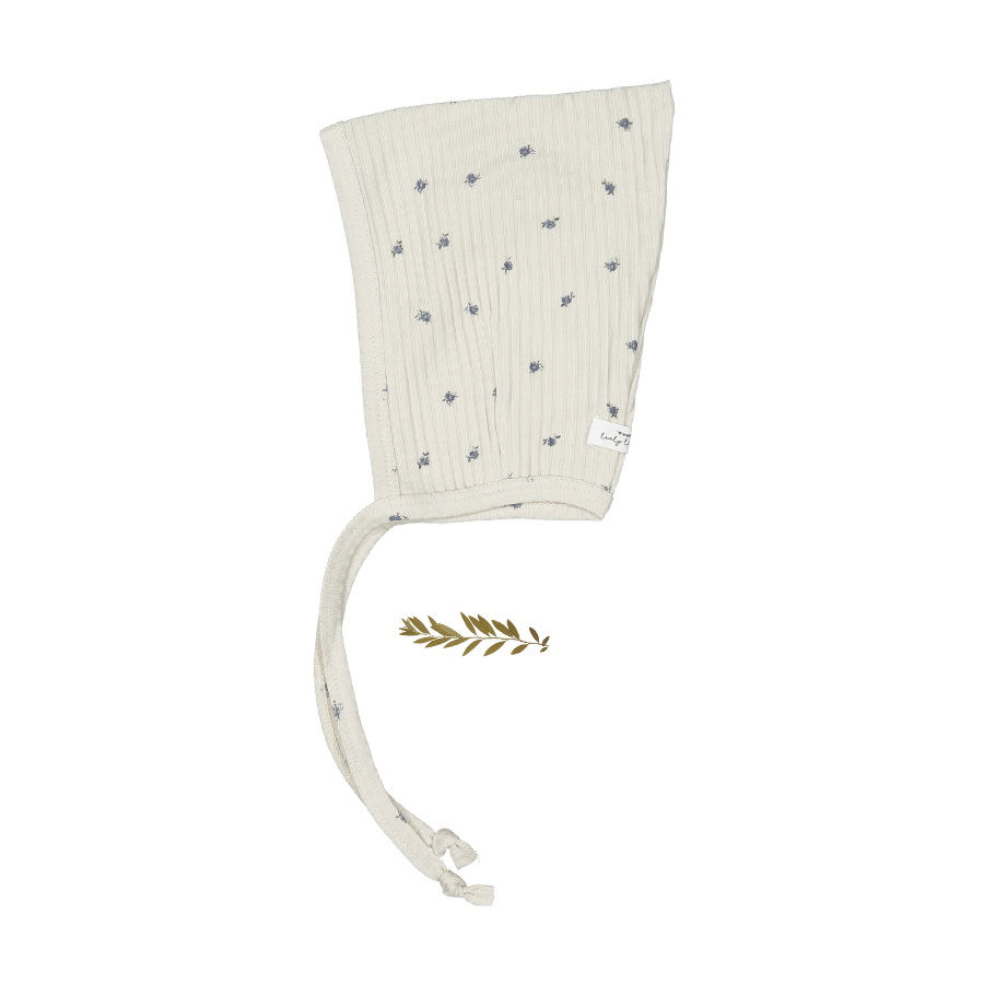 Pixie-style baby bonnet in a Rosa Blue print with ties under the chin