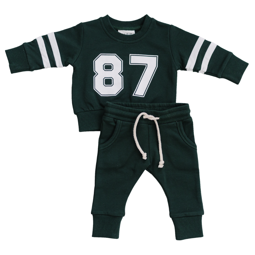 Two-piece French terry baby set with a bold number print on the top and matching pants in a relaxed fit.