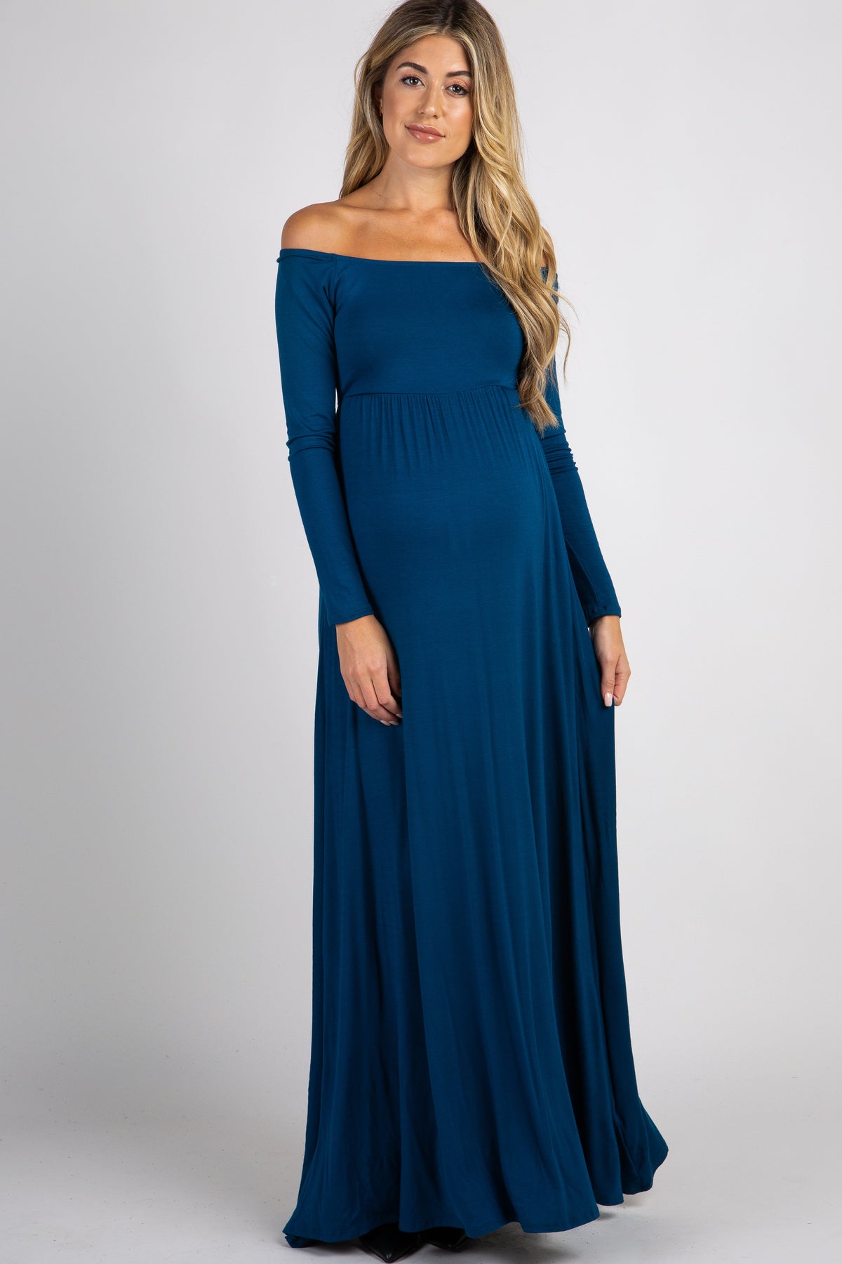 Dark teal off-shoulder maternity maxi dress with flowing skirt