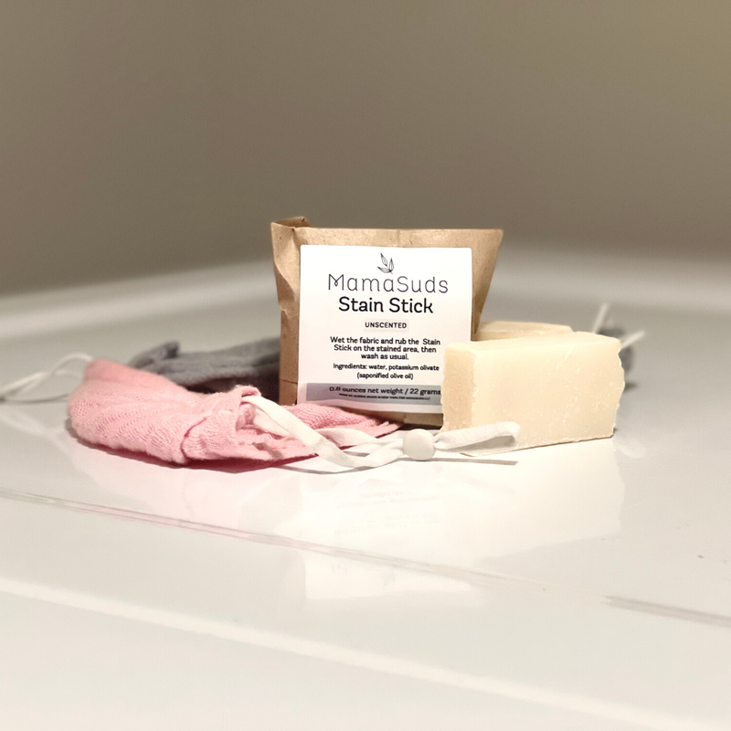 Laundry Stain Stick with packaging and accessories on white surface
