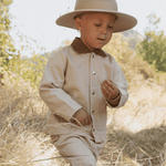 Oat-colored twill button-front jacket with a classic collar and front pockets
