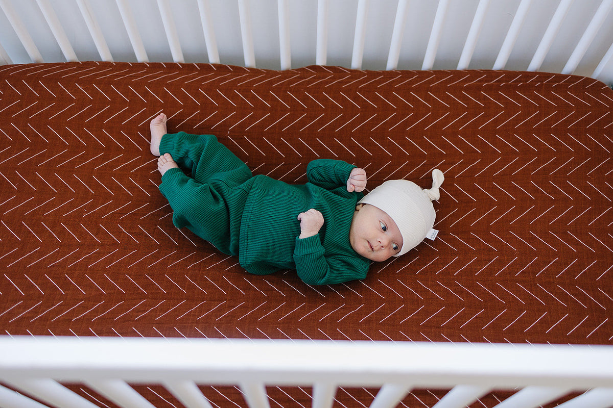 Rust Mudcloth Muslin Crib Sheet by Mebie Baby