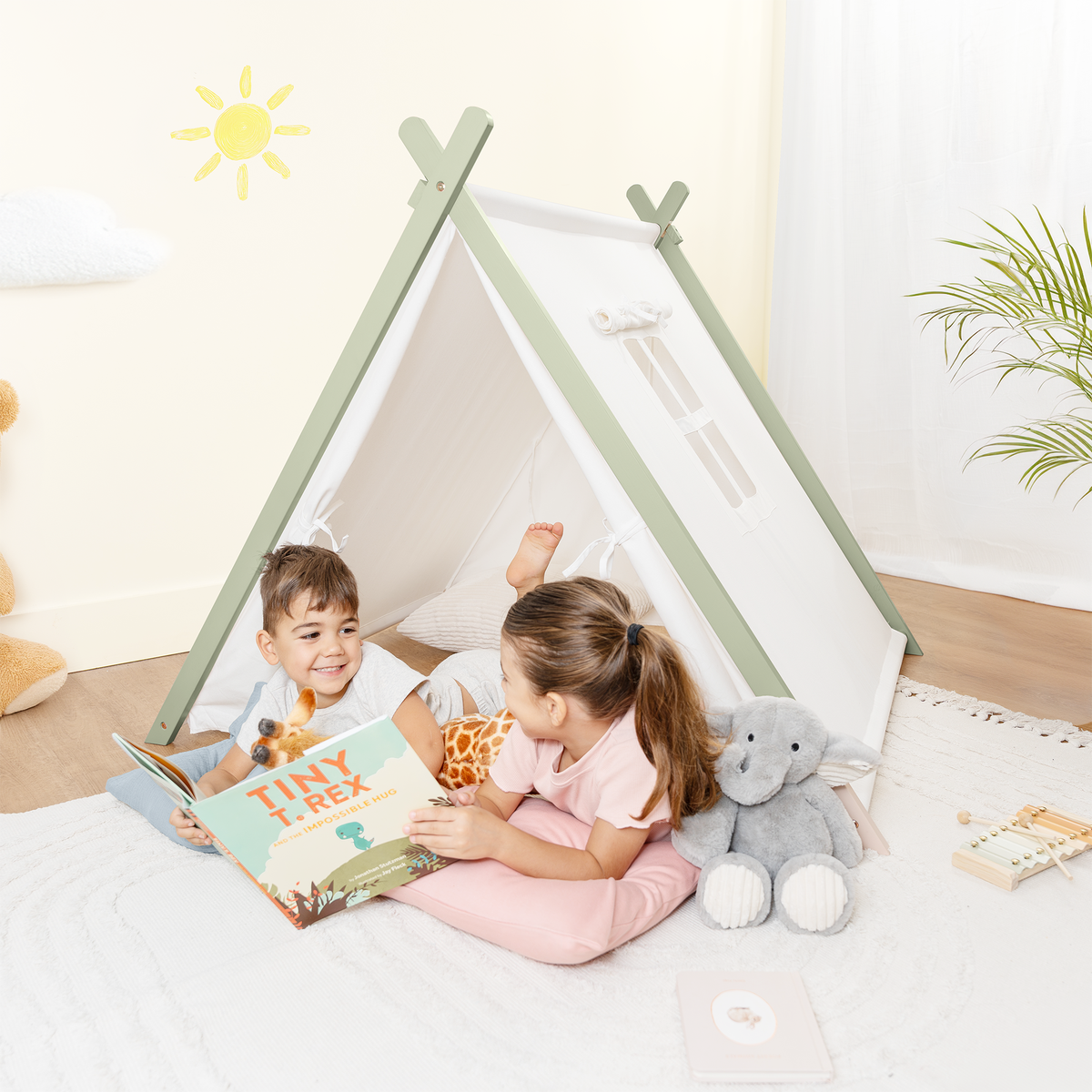 Comfy Cubs organic sage green indoor play tent for kids, featuring a cozy, safe play space.