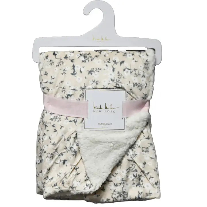 Crover baby blanket: ditsy floral mink front, plush sherpa back.
