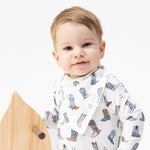 Baby bandana bib with a buckaroo boots print and snap closure