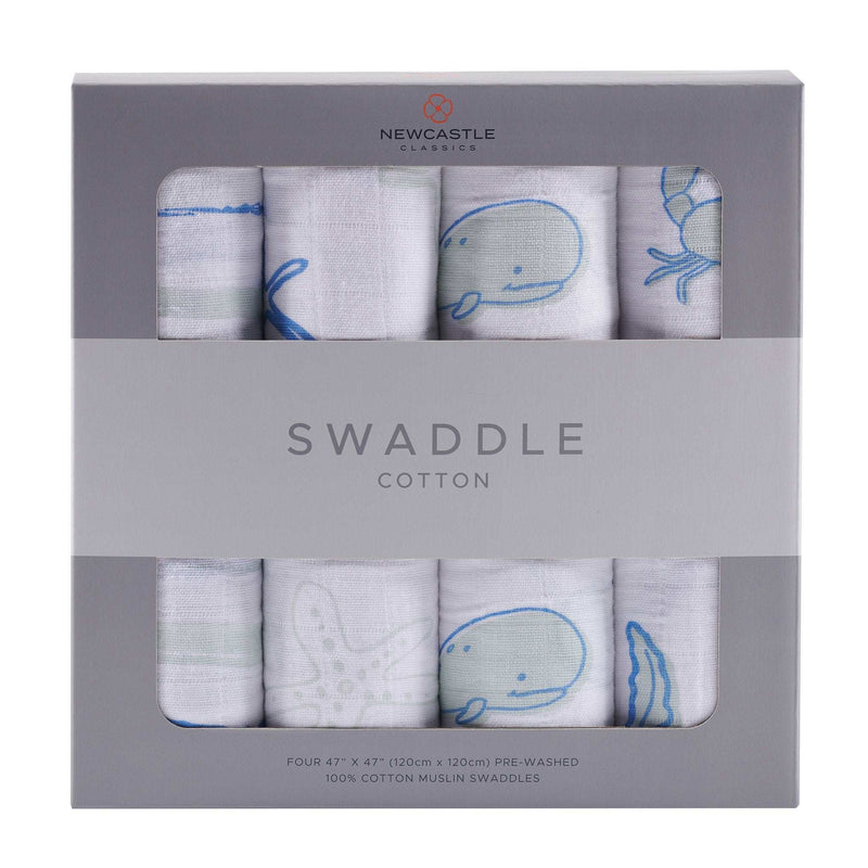 Ocean Friends Cotton Muslin Swaddle 4PK in packaging with whale and starfish designs.