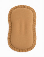 Solid brown baby lounger cover with ruffle trim around the edge and a hidden top zipper