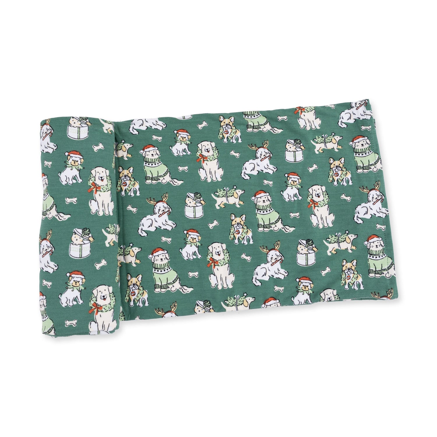 Swaddle blanket with a Christmas dogs print in holiday colors, shown spread flat