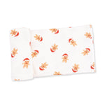 Ribbed modal baby swaddle blanket with a simple gingerbread man print