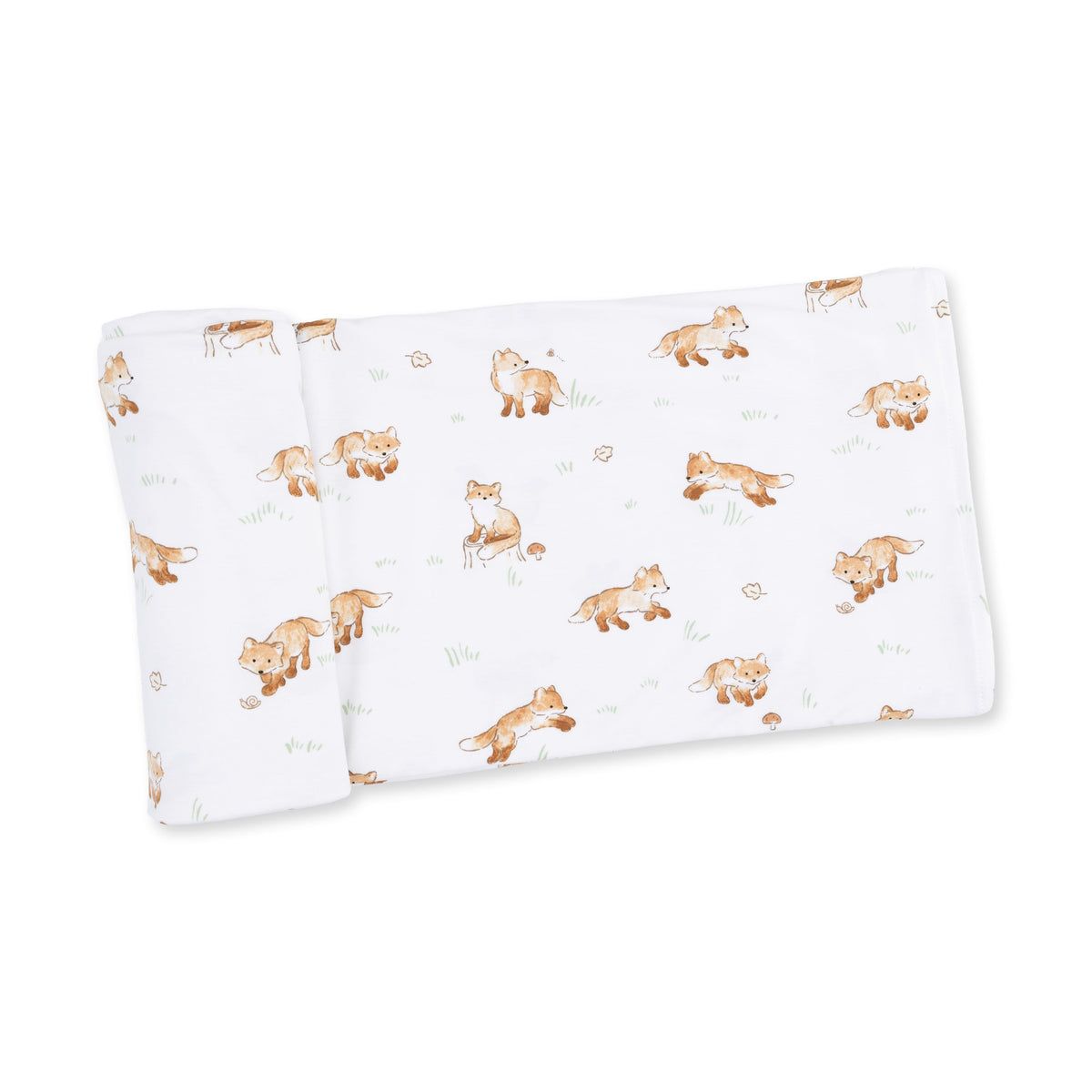 Swaddle blanket with a Little Explorer Fox print in soft muted tones, spread flat to show the pattern.
