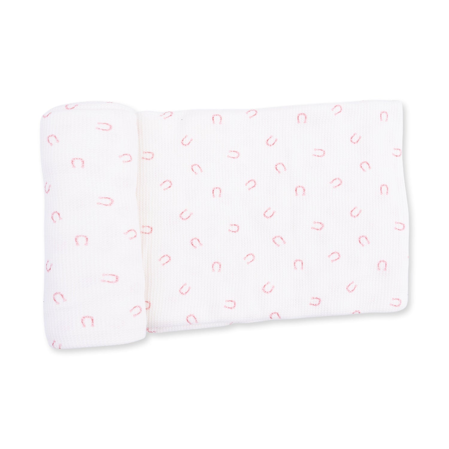 Pink swaddle blanket printed with a small horseshoe pattern, laid out flat.