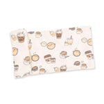 Swaddle blanket with a coffee-themed Love You A Latte print in warm neutral tones