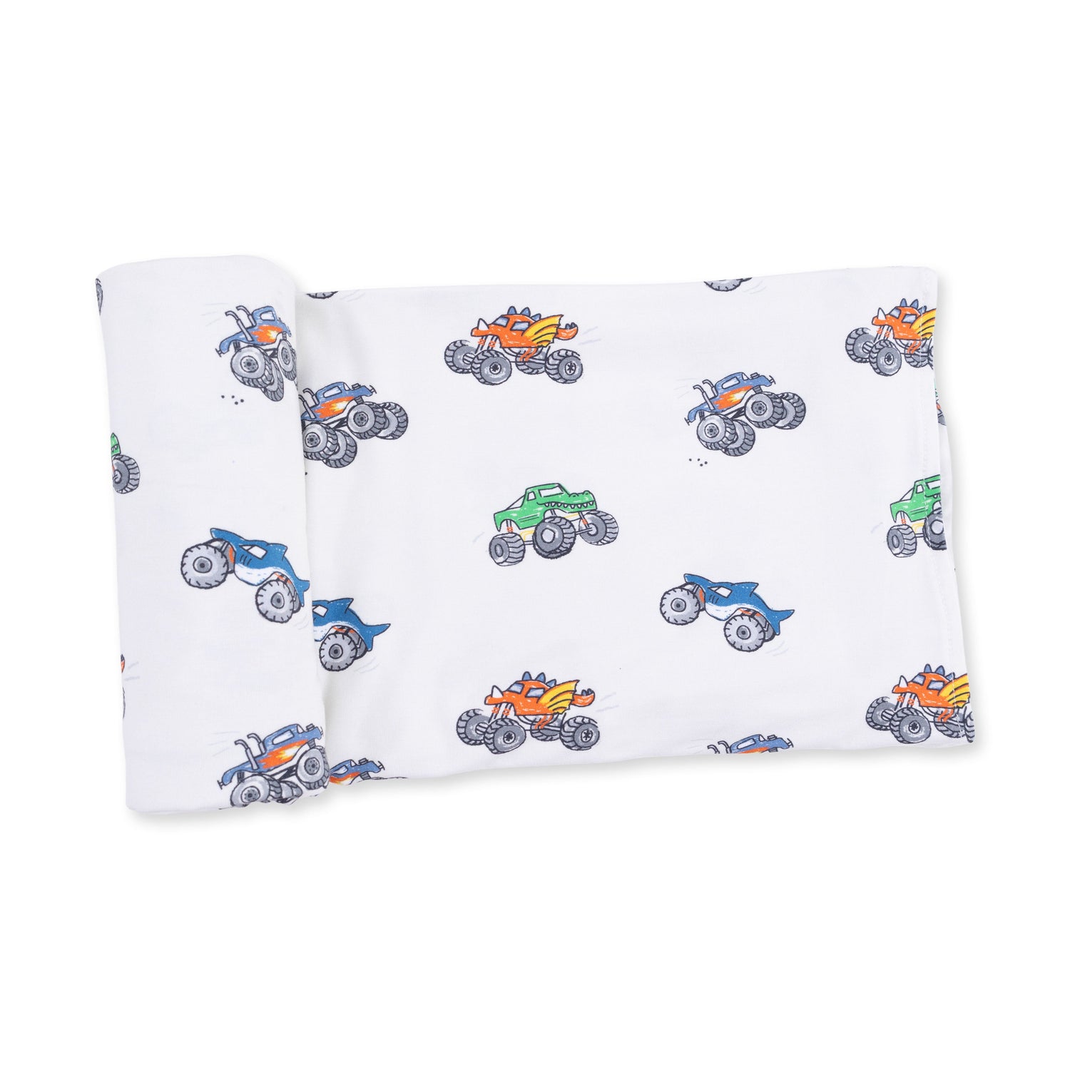 Swaddle blanket printed with a monster trucks pattern, spread flat to show the square design.