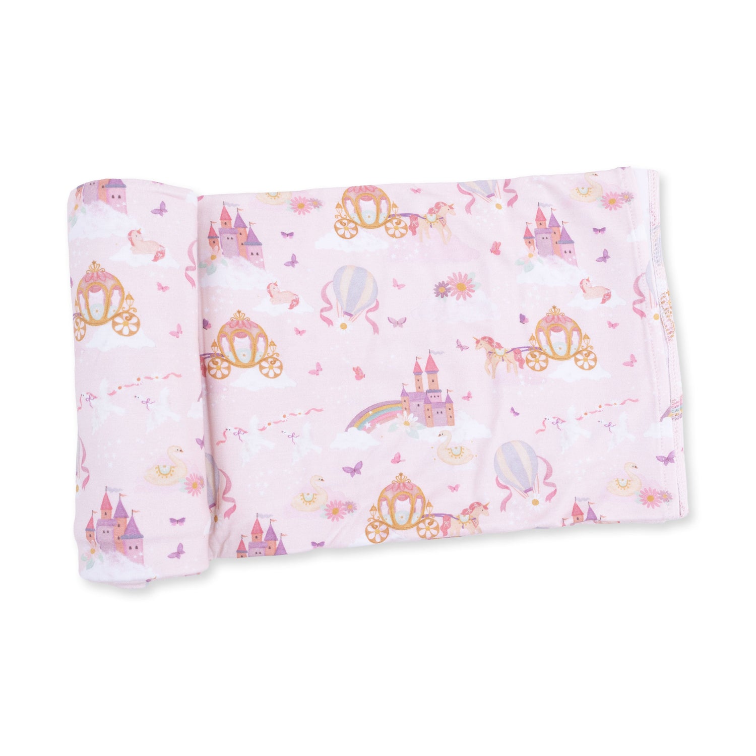Swaddle blanket printed with princesses, unicorns and castles in a soft fairytale pattern