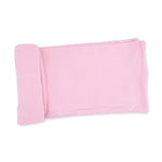 Swaddle blanket in solid candy pink, spread flat to show the smooth bamboo fabric.