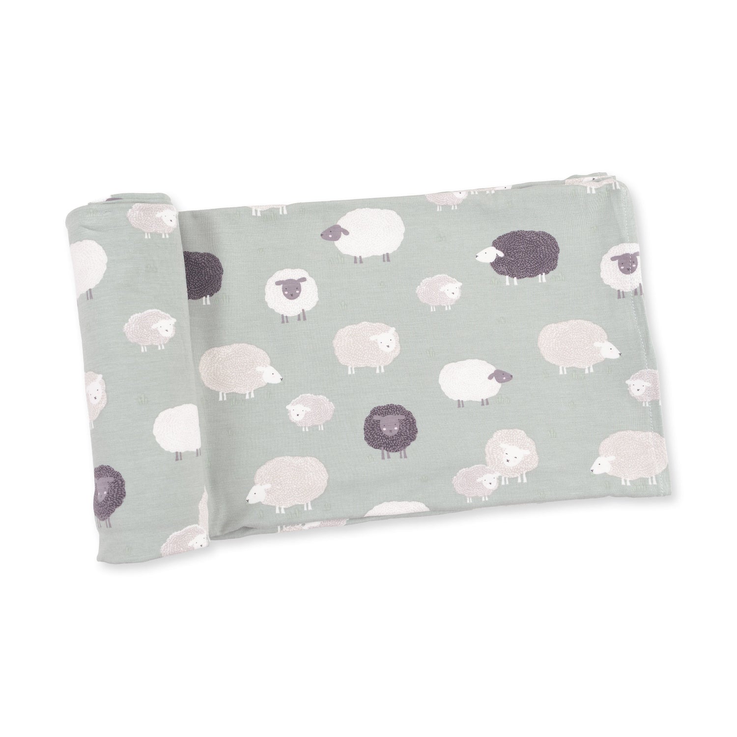 Swaddle blanket with a black sheep print, laid flat to show the design