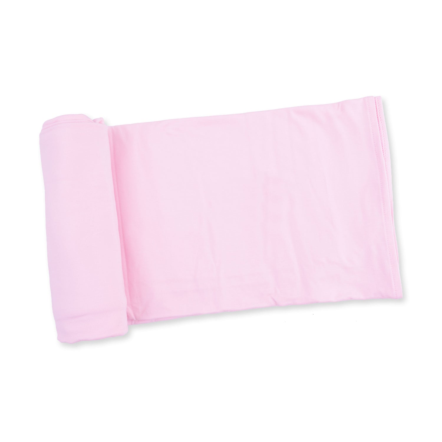 Swaddle Blanket in solid soft pink, laid flat with a lightly draped corner.