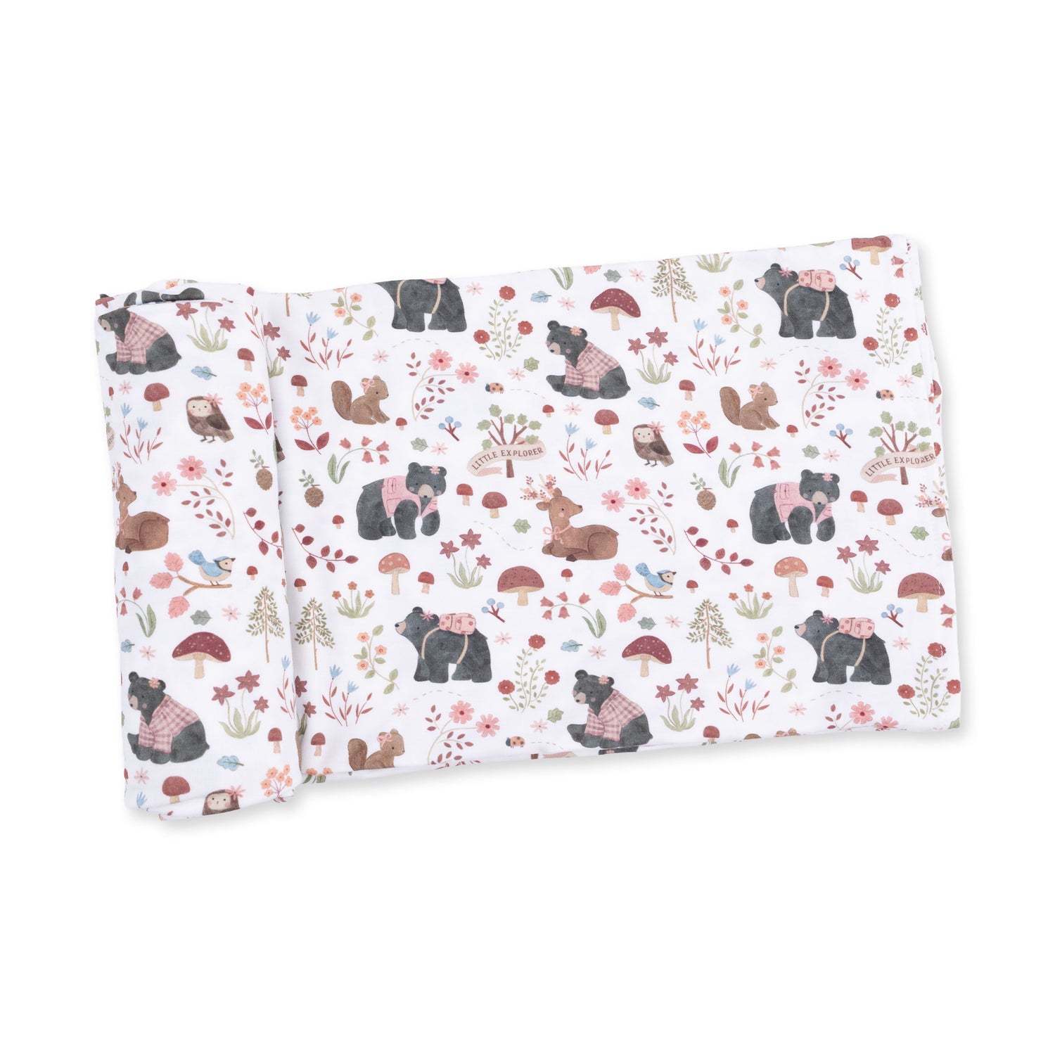 Pink swaddle blanket printed with woodland animals, spread flat to show the pattern.